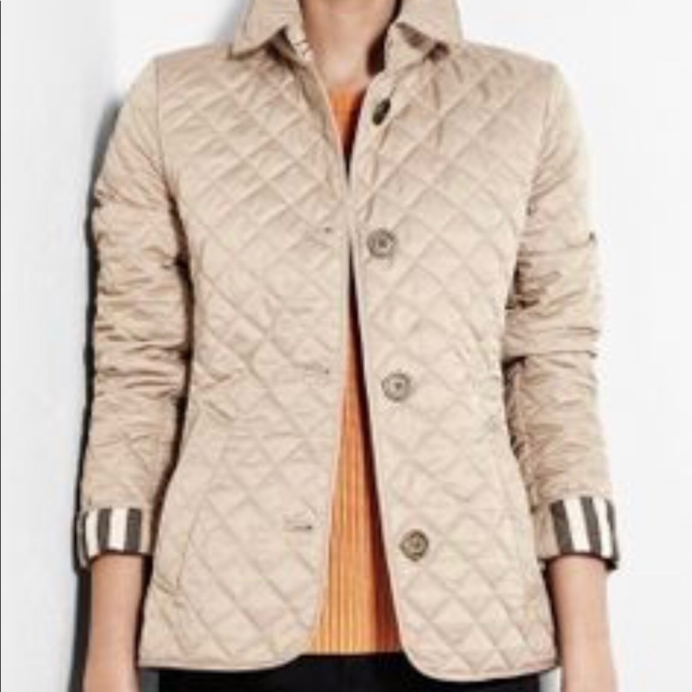 Beige Burberry jacket in excellent condition!